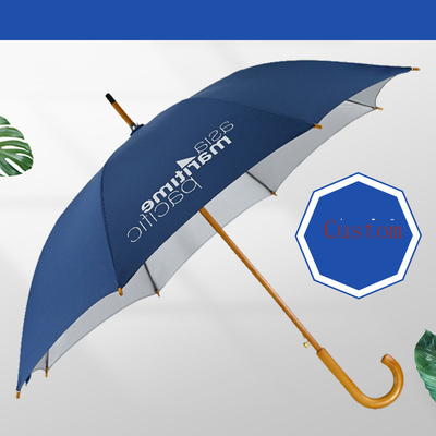Um guarda-chuva publicitário com fita de prata e impressão de logotipo tudo em uma função