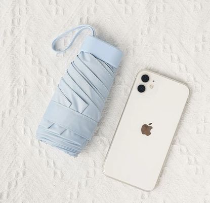 X503 Saco de cartão guarda-chuva Proteção UV e bolso pequeno para fácil transporte em dias ensolarados