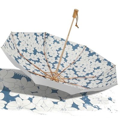 Um guarda-sol de liga de prata de titânio para proteção solar UV e resistência ao vento