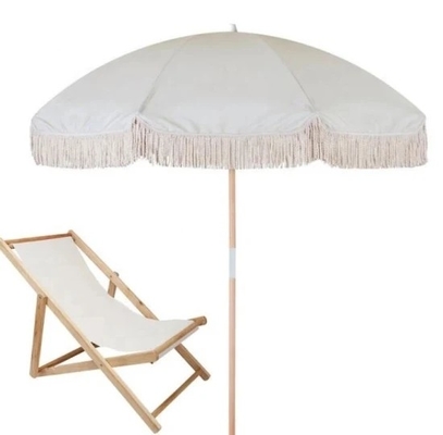 Um guarda-sol de praia com flanges de algodão e função tudo-em-um