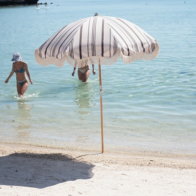 Atração turística obrigatória para o exterior Tassel Beach Paraguas com base de guarda-chuvas